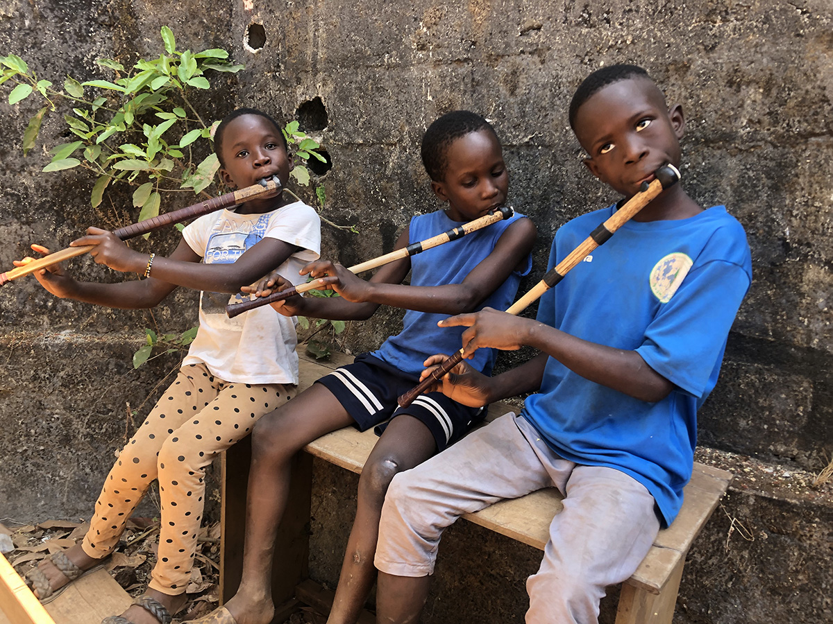 3 students with flutes